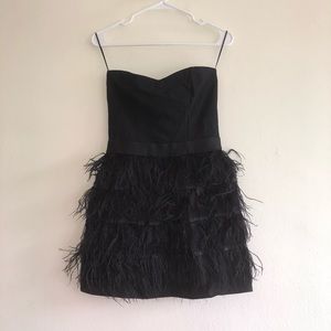 Strapless LBD with faux bird feather.